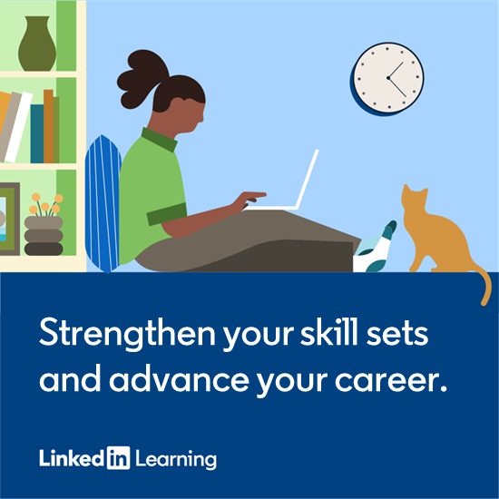 Girl sits on floor with laptop and cat