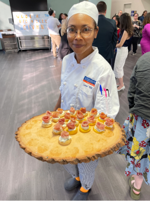 Sonya Dominguez presents salmon canapes during service&nbsp;